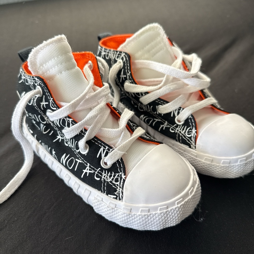 Converse Kids Black and White Sneakers with Orange Accents